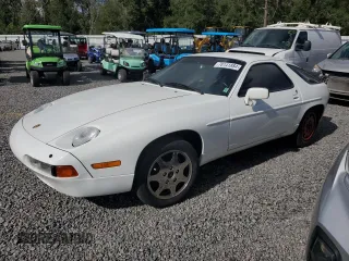 1988 Porsche 928 z VIN WP0JB0924JS861268, wystawiony jako Copart lot #78141884 z przebiegiem 45 908 mil mil oraz Szkody całkowita. Historia ofert i sprzedaży dostępna na DreamBid. Obrazek 1.
