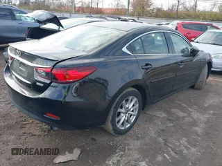 2015 Mazda 6 i Sport with VIN JM1GJ1U5XF1214570, listed as a IAAI auction lot 41003789 with 99,844 mi miles. Bid and sale history available at carsss.com. Image 4.
