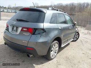 2012 Acura RDX with VIN 5J8TB1H21CA001175, listed as a IAAI auction lot 42038674 with 218,947 mi miles. Bid and sale history available at carsss.com. Image 4.