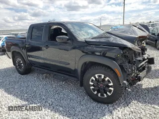 2023 Nissan Frontier Pro-4X with VIN 1N6ED1EK9PN653818, listed as a Copart auction lot 50932735 with 55,466 mi miles and Salvage title. Bid and sale history available at DreamBid. Image 4.