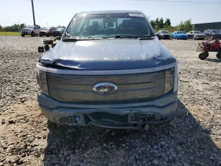 2023 Ford F-150 Lightning Pro с VIN 1FT6W1EV1PWG53186, выставлен на аукционе Copart как лот 52423485 с пробегом 23 518 миль миль и Списание • Salvage title. История ставок и продаж доступна на DreamBid. Изображение 5.