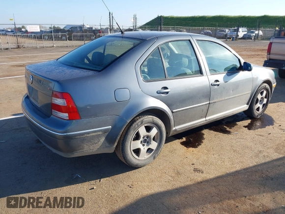 2004 Volkswagen Jetta GL z VIN 3VWRA69M64M044291, wystawiony jako IAAI lot #41882666 z przebiegiem 205 029 mil mil oraz . Historia ofert i sprzedaży dostępna na DreamBid. Obrazek 4.