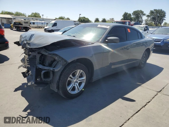 2019 Dodge Charger SXT with VIN 2C3CDXBGXKH659890, listed as a Copart auction lot 58011735 with 112,293 mi miles and Salvage title. Bid and sale history available at DreamBid. Image 1.