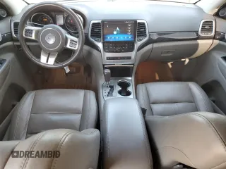 2011 Jeep Grand Cherokee Laredo with VIN 1J4RR4GGXBC642759, listed as a Copart auction lot 55767575 with 144,104 mi miles and Salvage title. Bid and sale history available at DreamBid. Image 8.