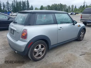 2007 MINI Hardtop with VIN WMWMF33557TU61953, listed as a IAAI auction lot 42678840 with 139,665 mi miles and . Bid and sale history available at DreamBid. Image 4.