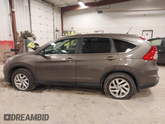 2015 Honda CR-V EX with VIN 2HKRM4H56FH670649, listed as a IAAI auction lot 42007616 with 142,353 mi miles and . Bid and sale history available at DreamBid. Image 14.