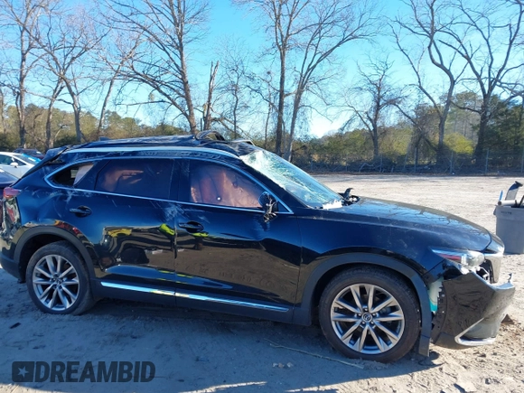 2018 Mazda CX-9 Grand Touring z VIN JM3TCADY5J0204845, wystawiony jako IAAI lot #41292695 z przebiegiem 98 751 mil mil oraz . Historia ofert i sprzedaży dostępna na DreamBid. Obrazek 13.