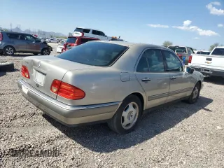1997 Mercedes-Benz E-Class with VIN WDBJF72F2VA274233, listed as a Copart auction lot 74123554 with 80,914 mi miles and Salvage Title. Bid and sale history available at carsss.com. Image 3.