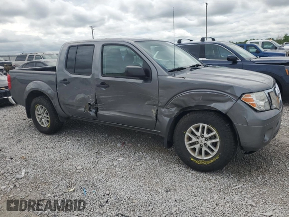 2019 Nissan Frontier SV with VIN 1N6AD0EV9KN701104, listed as a Copart auction lot 56704705 with 76,882 mi miles and Salvage title. Bid and sale history available at DreamBid. Image 4.
