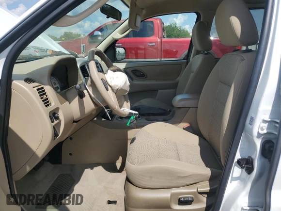 2005 Ford Escape XLT z VIN 1FMYU93145DA04306, wystawiony jako Copart lot #56209425 z przebiegiem 124 956 mil mil oraz Szkoda całkowita • Salvage title. Historia ofert i sprzedaży dostępna na DreamBid. Obrazek 7.