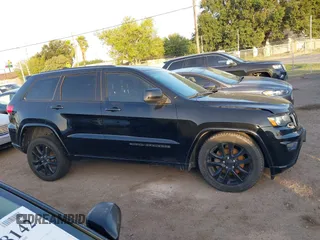 2017 Jeep Grand Cherokee Altitude with VIN 1C4RJEAG3HC854343, listed as a IAAI auction lot 42519303 with 136,721 mi miles and . Bid and sale history available at DreamBid. Image 14.