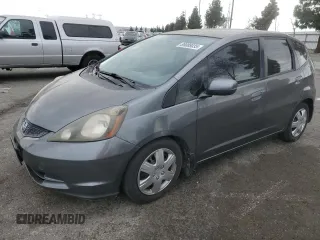 2013 Honda Fit with VIN JHMGE8H3XDC042658, listed as a Copart auction lot 89088035 with 129,132 mi miles and Salvage Title. Bid and sale history available at carsss.com. Image 1.