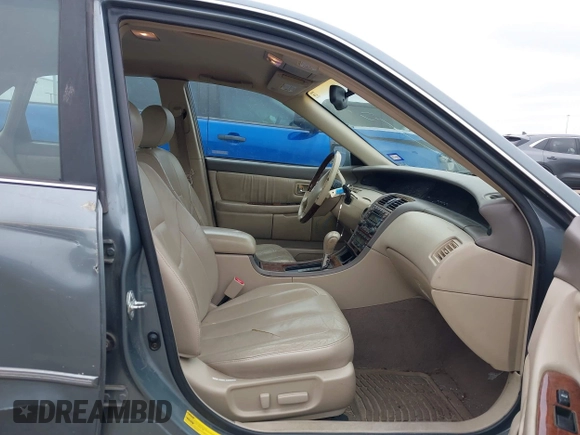 2004 Toyota Avalon XL with VIN 4T1BF28B84U370390, listed as a IAAI auction lot 41351151 with 242,910 mi miles and . Bid and sale history available at DreamBid. Image 5.