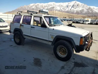 1988 Jeep Cherokee with VIN 1JCMR7813JT058390, listed as a Copart auction lot 89071925 with 2,331,297 mi miles and Clean title. Bid and sale history available at DreamBid. Image 4.