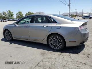 2015 Lincoln MKZ Hybrid z VIN 3LN6L2LU3FR608806, wystawiony jako Copart lot #57187835 z przebiegiem 151 462 mil mil oraz Czysty tytuł • Clean title. Historia ofert i sprzedaży dostępna na DreamBid. Obrazek 2.