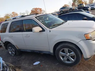 2011 Ford Escape Limited with VIN 1FMCU0E72BKA06425, listed as a IAAI auction lot 41095359 with 174,075 mi miles. Bid and sale history available at carsss.com. Image 13.