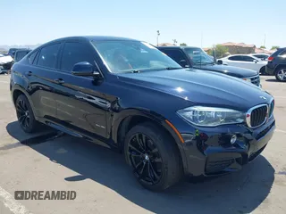 2018 BMW X6 xDrive35i z VIN 5UXKU2C59J0Z61373, wystawiony jako IAAI lot #42451996 z przebiegiem 66 372 mil mil oraz . Historia ofert i sprzedaży dostępna na DreamBid. Obrazek 1.