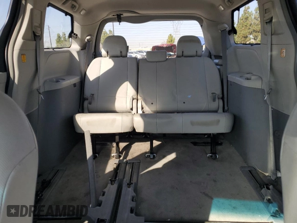 2013 Toyota Sienna XLE AAS with VIN 5TDYK3DC5DS322039, listed as a Copart auction lot 61657715 with 185,269 mi miles and Salvage title. Bid and sale history available at DreamBid. Image 10.
