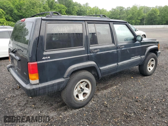 1999 Jeep Cherokee Sport with VIN 1J4FF68S8XL671341, listed as a Copart auction lot 58136475 with 139,848 mi miles and Salvage title. Bid and sale history available at DreamBid. Image 3.