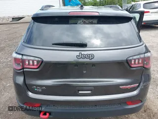 2020 Jeep Compass Trailhawk with VIN 3C4NJDDB3LT200268, listed as a IAAI auction lot 42250192 with 73,804 mi miles and . Bid and sale history available at DreamBid. Image 16.