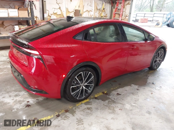 2024 Toyota Prius LE with VIN JTDACAAUXR3039886, listed as a IAAI auction lot 41928633 with 1,468 mi miles and . Bid and sale history available at DreamBid. Image 4.
