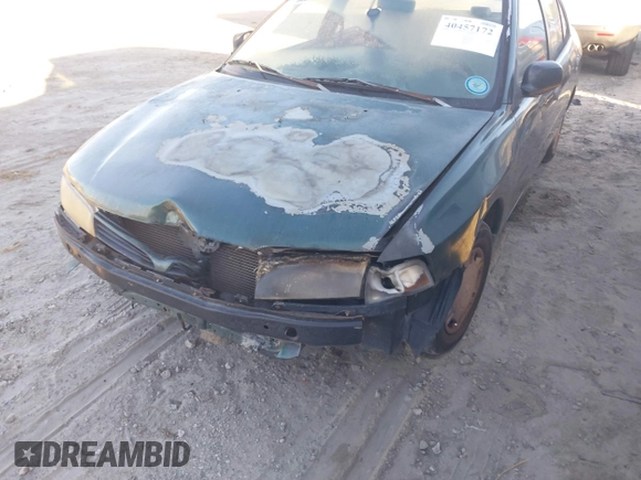 1999 Mitsubishi Mirage DE z VIN JA3AY26A0XU017889, wystawiony jako IAAI lot #40457172 z przebiegiem Nie podano mil oraz . Historia ofert i sprzedaży dostępna na DreamBid. Obrazek 6.