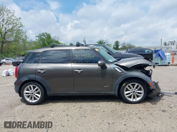 2013 MINI Countryman S ALL4 with VIN WMWZC5C58DWP30600, listed as a IAAI auction lot 42203285 with 76,796 mi miles and . Bid and sale history available at DreamBid. Image 14.