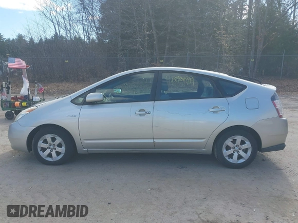 2005 Toyota Prius with VIN JTDKB20U653014332, listed as a IAAI auction lot 42010139 with 128,147 mi miles. Bid and sale history available at carsss.com. Image 12.