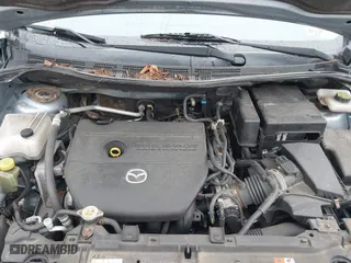 2012 Mazda Mazda5 Sport with VIN JM1CW2BL0C0141119, listed as a IAAI auction lot 42073200 with 142,805 mi miles. Bid and sale history available at carsss.com. Image 10.