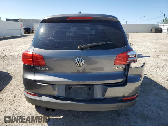 2012 Volkswagen Tiguan SE z VIN WVGAV7AX2CW004364, wystawiony jako Copart lot #55408655 z przebiegiem 271 198 mil mil oraz Szkoda całkowita • Salvage title. Historia ofert i sprzedaży dostępna na DreamBid. Obrazek 6.