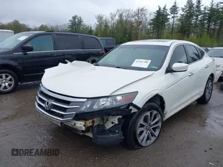 2010 Honda Crosstour EX-L z VIN 5J6TF2H55AL010444, wystawiony jako IAAI lot #42187788 z przebiegiem 217 940 mil mil oraz . Historia ofert i sprzedaży dostępna na DreamBid. Obrazek 2.