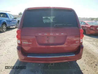 2014 Dodge Grand Caravan SXT z VIN 2C4RDGCG8ER103869, wystawiony jako Copart lot #61835365 z przebiegiem 193 139 mil mil oraz Czysty tytuł • Clean title. Historia ofert i sprzedaży dostępna na DreamBid. Obrazek 6.