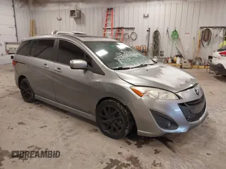 2012 Mazda 5 Touring with VIN JM1CW2CL1C0107706, listed as a IAAI auction lot 41551479 with 123,418 mi miles. Bid and sale history available at carsss.com. Image 1.