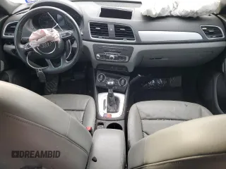 2017 Audi Q3 Premium z VIN WA1BCCFS0HR016968, wystawiony jako Copart lot #79358604 z przebiegiem Nie podano mil oraz Szkody całkowita. Historia ofert i sprzedaży dostępna na DreamBid. Obrazek 8.