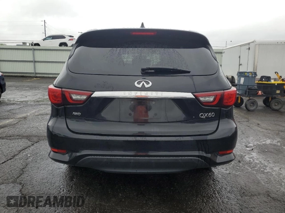 2020 Infiniti QX60 Pure with VIN 5N1DL0MM8LC517826, listed as a Copart auction lot 56527385 with 83,767 mi miles and Salvage title. Bid and sale history available at DreamBid. Image 6.