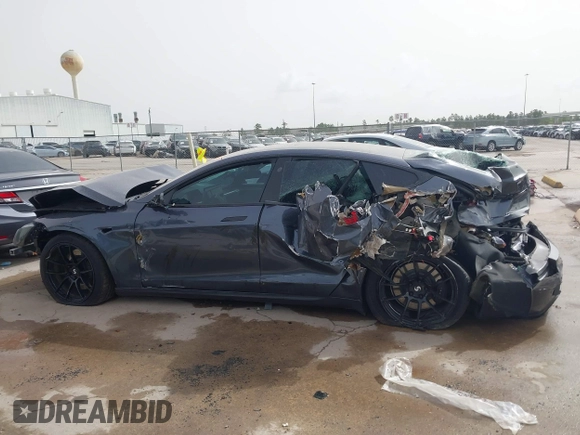2021 Tesla Model S Plaid z VIN 5YJSA1E6XMF429436, wystawiony jako IAAI lot #41826114 z przebiegiem Nie podano mil oraz . Historia ofert i sprzedaży dostępna na DreamBid. Obrazek 14.