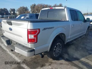 2019 Ford F-150 XL with VIN 1FTEW1CP4KKC34877, listed as a IAAI auction lot 41647021 with 61,974 mi miles and . Bid and sale history available at carsss.com. Image 4.