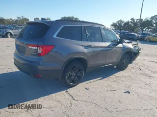 2022 Honda Pilot Special Edition with VIN 5FNYF5H25NB035016, listed as a IAAI auction lot 41248194 with 30,039 mi miles and . Bid and sale history available at DreamBid. Image 4.