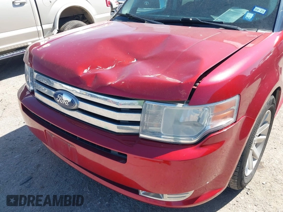 2009 Ford Flex SEL with VIN 2FMDK52C89BA77688, listed as a IAAI auction lot 41763979 with 196,989 mi miles. Bid and sale history available at carsss.com. Image 6.