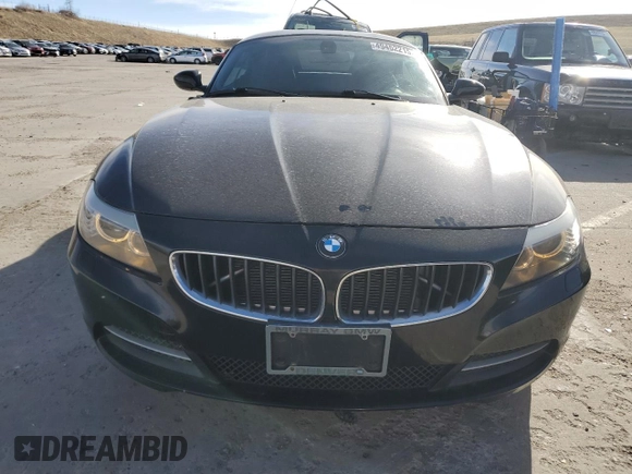 2013 BMW Z4 sDrive28i with VIN WBALL5C50DJ103778, listed as a Copart auction lot 49452215 with 104,203 mi miles and Salvage Title. Bid and sale history available at carsss.com. Image 5.