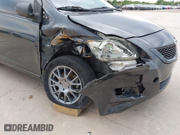 2009 Toyota Yaris with VIN JTDBT903994050383, listed as a IAAI auction lot 42134282 with 122,824 mi miles and . Bid and sale history available at DreamBid. Image 6.