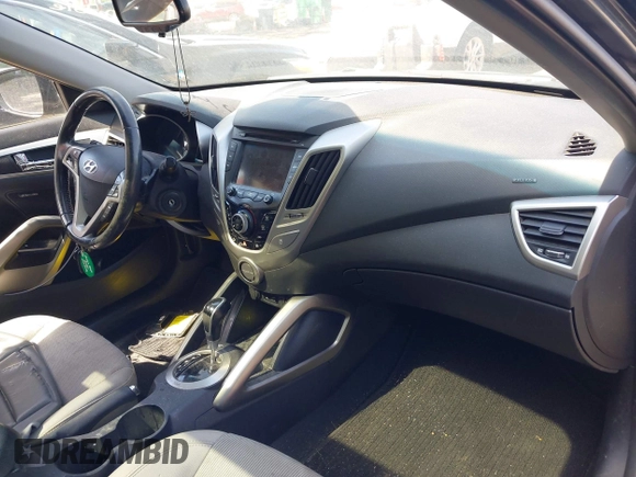 2013 Hyundai Veloster w/Black Int with VIN KMHTC6AD2DU120059, listed as a IAAI auction lot 42355902 with 81,221 mi miles and . Bid and sale history available at DreamBid. Image 5.