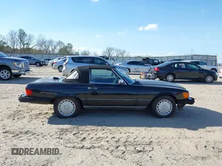 1986 Mercedes-Benz 560 Series 560SL with VIN WDBBA48D2GA055024, listed as a IAAI auction lot 41888928 with 118,569 mi miles. Bid and sale history available at carsss.com. Image 13.