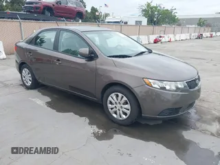 2013 Kia Forte EX with VIN KNAFU4A22D5711825, listed as a IAAI auction lot 42128778 with 112,889 mi miles. Bid and sale history available at carsss.com. Image 1.