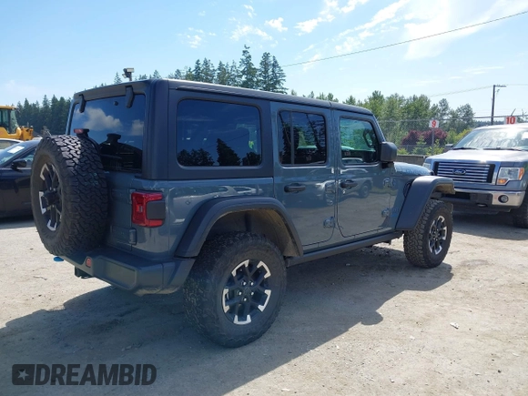 2024 Jeep Wrangler Rubicon X z VIN 1C4RJXR6XRW240316, wystawiony jako IAAI lot #42477607 z przebiegiem 41 375 mil mil oraz . Historia ofert i sprzedaży dostępna na DreamBid. Obrazek 4.