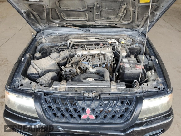 2001 Mitsubishi Montero ES z VIN JA4LS21H11P003533, wystawiony jako Copart lot #54403045 z przebiegiem 241 477 mil mil oraz Szkoda całkowita • Salvage title. Historia ofert i sprzedaży dostępna na DreamBid. Obrazek 11.