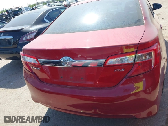 2014 Toyota Camry SE with VIN 4T1BK1FK8EU547143, listed as a IAAI auction lot 41876192 with 209,535 mi miles. Bid and sale history available at carsss.com. Image 16.