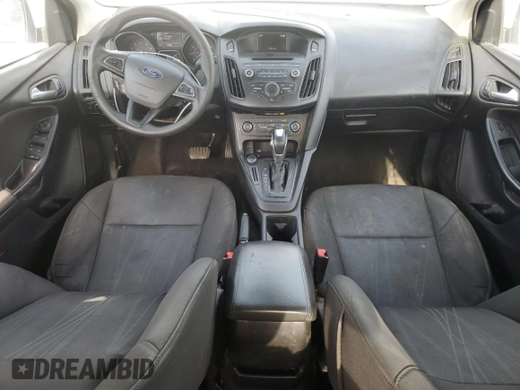 2015 Ford Focus SE with VIN 1FADP3F2XFL220072, listed as a Copart auction lot 58058255 with 128,871 mi miles and Clean title. Bid and sale history available at DreamBid. Image 8.