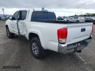 2017 Toyota Tacoma SR5 with VIN 3TMAZ5CN9HM040066, listed as a IAAI auction lot 41490470 with 119,221 mi miles. Bid and sale history available at carsss.com. Image 3.