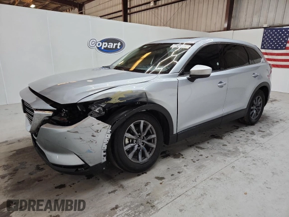 2023 Mazda CX-9 Touring with VIN JM3TCBCY9P0656636, listed as a Copart auction lot 64243905 with 59,788 mi miles and Non repairable. Bid and sale history available at DreamBid. Image 1.